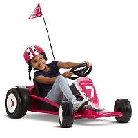 girl drifting in the pink go-kart with a large number 7 on the front